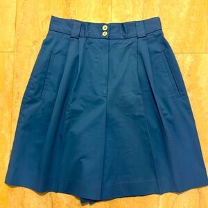 Christian Dior shorts.